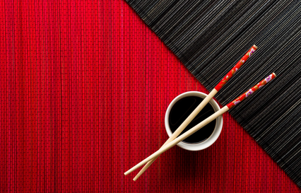 chopsticks and a bowl of soup