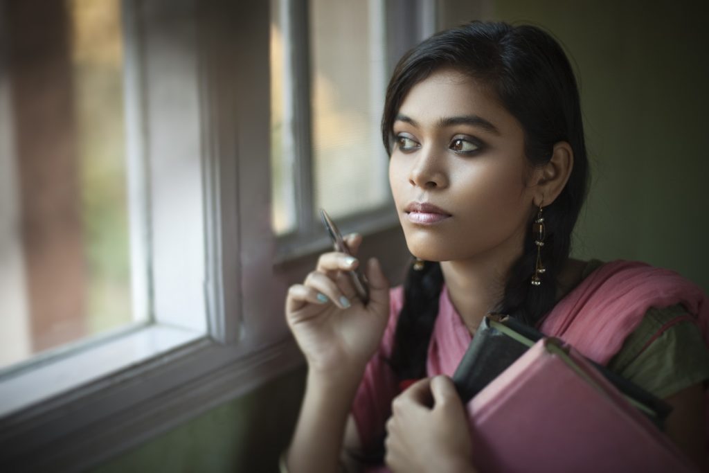 woman gazing out the window