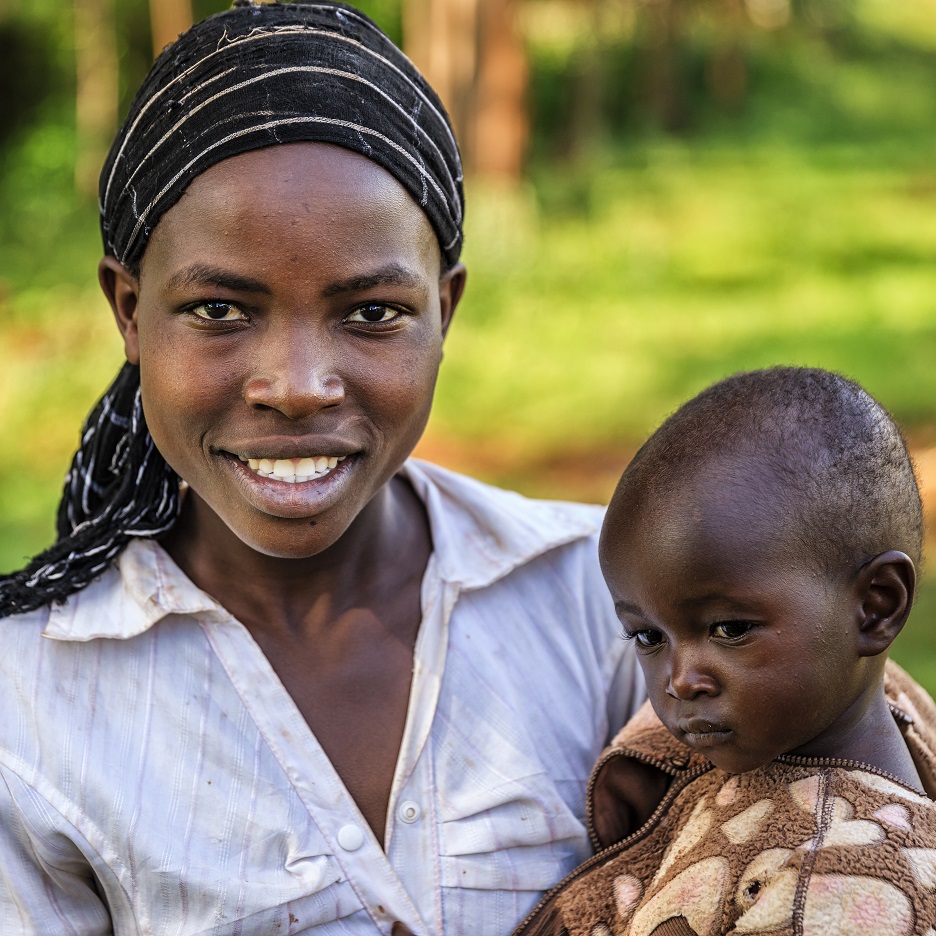 Young African woman holding her baby, Kenya, East Africa