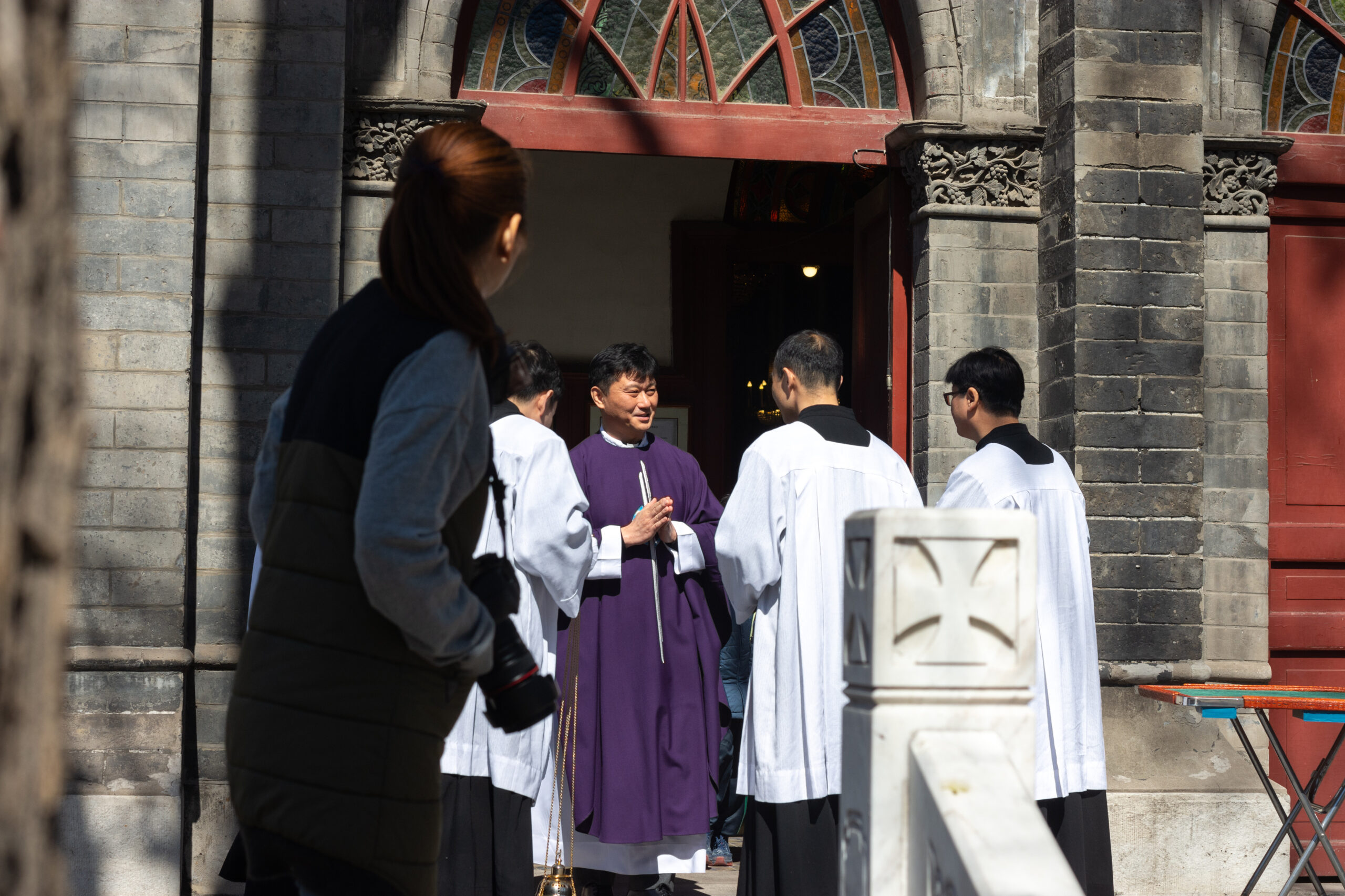 Beijing / China: Chinese catholic priests at St. Michael Church