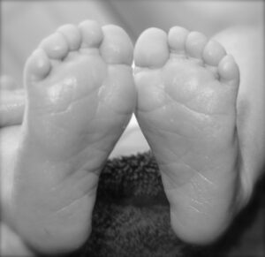 The newborn feet of Mr. and Mrs. Mosher's grandson The newborn feet of Mr. and Mrs. Mosher's grandson